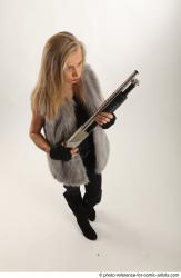 NIKOL STANDING POSE WITH SHOTGUN